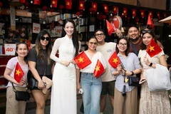Visitors’ delight as the nation comes together to celebrate the grand occasion. (Photo: VietnamPlus)