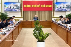 At the working session on the Vietnam International Financial Centre (VIFC) (Photo: VNA)