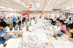Garment production for export at Hoa Tho Garment JS Corporation. (Photo: nhandan.vn)