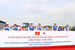 Delegates at the first train arrival ceremony of Ho Chi Minh City urban railway construction project Ben Thanh - Suoi Tien (Photo: VNA) 