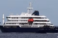 The MV Hondius cruise ship departs the port in Praia, Cape Verde on May 6. (Photo: AP)