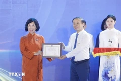 The VNA wins an A prize for its eye-catching exhibition booth. (Photo: VNA)