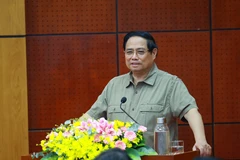 PM Pham Minh Chinh speaks at the working session (Photo: VNA)
