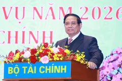 Prime Minister Pham Minh Chinh speaks at a conference reviewing the finance sector’s financial, budgetary, investment and socio-economic development efforts in 2025 and outlining tasks for 2026 held in Hanoi on January 6. (Photo: VNA)
