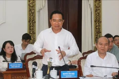Chairman of the People's Committee of HCM City Nguyen Van Duoc speaks at the meeting. (Photo: VNA)
