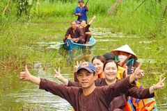 Tourists visit an eco-tourism site in the U Minh Ha forest in Ca Mau province (Photo: VNA)