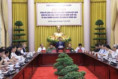 Deputy head of the Presidential Office Pham Thanh Ha (centre) speaks at the press conference on July 3. (Photo: VNA)