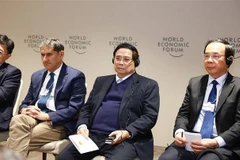 PM Pham Minh Chinh (second from right) at the seminar (Photo: VNA)