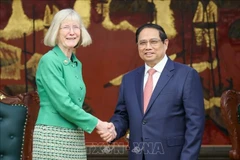 Prime Minister Pham Minh Chinh hosts a reception for Australian Ambassador Gillian Bird in Hanoi on July 2. (Photo: VNA)