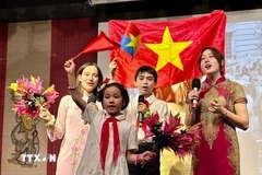 A singing performance at the event (Photo: VNA)