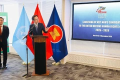 Deputy Minister of Foreign Affairs Do Hung Viet (R) at the launching ceremony of Vietnam's candidature for re-election to the UNHRC for the 2026-2028 tenure. (Photo: VNA)