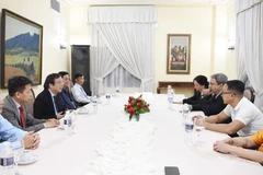 At the meeting between Chairman of the Members' Council and CEO of Vietnam Education Publishing House Nguyen Tien Thanh and Cuban Minister of Higher Education Walter Baluja García. (Photo: VNA)