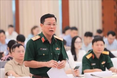 Major General Tong Van Thanh, Deputy Director of the Department of Information and Training under the General Department of Politics of the Vietnam People's Army addresses at the press conference. (Photo: VNA)