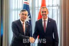 Australian Treasurer Jim Chalmers (right) and Vietnamese Minister of Finance Ngo Van Tuan at their meeting in Sydney on August 11 (Photo: Ministry of Finance)