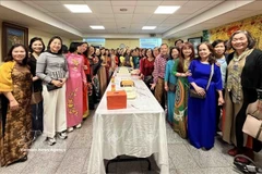 Members of the Vietnamese Women's Association in Belgium at the gathering (Photo: VNA)