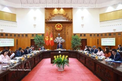 At the third meeting of the National Steering Committee for Financial Inclusion (Photo: VNA)