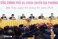 Party General Secretary To Lam (third from left), State President Luong Cuong (second from left), Prime Minister Pham Minh Chinh (fourth from left) and National Assembly Chairman Tran Thanh Man (first from left), and other officials attend the conference on January 8. (Photo: VNA)