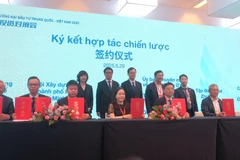 At the signing ceremony between NSSC and CCPIT (Photo: VNA)