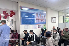 Medicine support programmes provide significant benefits to patients throughout their course of treatment. (Photo: VNA)