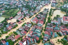 More than 5,000 households in Yen Bai ward, Lao Cai province, are affected by flood. (Photo: VNA)