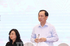 Deputy Governor of the State Bank of Vietnam (SBV) Dao Minh Tu speaks at the Government’s monthly regular press conference on May 6. (Photo: VNA)