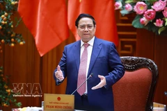 Prime Minister Pham Minh Chinh speaks at the meeting of permanent Government members in Hanoi on March 16. (Photo: VNA)