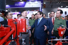 PM Pham Minh Chinh visits the Secutech+ Vietnam exhibition. (Photo: VNA)