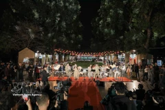 Guests experience an outdoor music performance featuring a live orchestra at the opening ceremony of the Hanoi Tourism Festival 2026 at Thong Nhat Park on March 13 evening. (Photo: VNA)