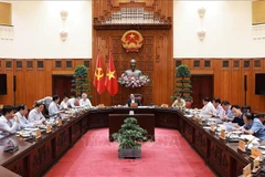 At the meeting of the Government Party Committee's Standing Board in Hanoi on July 1 (Photo: VNA)