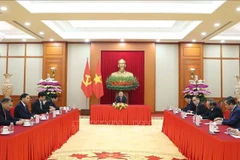 General Secretary of the Communist Party of Vietnam (CPV) Central Committee To Lam (C) holds phone talks with General Secretary of the Communist Party of China (CPC) Central Committee and President of China Xi Jinping on January 15. (Photo: VNA)