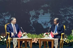 General Secretary of the Communist Party of Vietnam (CPV) Central Committee To Lam (left) and Speaker of the People's Consultative Assembly (MPR) of Indonesia Ahmad Muzani in Jakarta on March 11. (Photo: VNA)