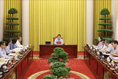 State President Luong Cuong holds a working session with the Presidential Office on August 27 to review tasks for August and outline priorities for September. (Photo: VNA)