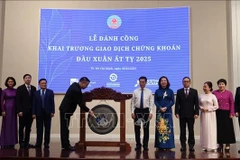 The New Year opening ceremony for the stock market held at the Ho Chi Minh City Stock Exchange (HOSE) on February 5 (Photo: VNA)