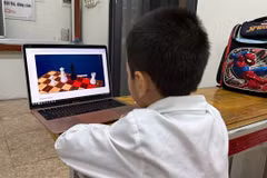 There should be a concerted effort to protect children in the cyber space. (Photo: VNA)