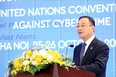 Deputy Minister of Public Security Senior Lieutenant General Pham The Tung addresses the policy discussion in Hanoi on October 26. (Photo: VNA)