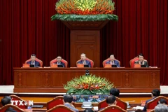 Party General Secretary To Lam (centre) chairs the conference on December 11. (Photo: VNA)