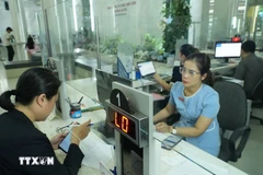 Saigon ward effectively implements electronic authentication to serve people. (Photo: VNA)