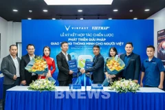 At the signing ceremony between Vinfast and Vietmap. (Photo: VNA)