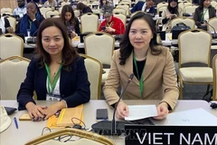 Ambassador Nguyen Thi Van Anh (R), Permanent Representative of Vietnam to UNESCO, at the 43rd session of the UNESCO General Conference held in Samarkand, Uzbekistan. (Photo published by VNA)