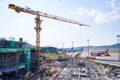 The Phu Quoc International Airport expansion is underway while the terminal remains operational (Photo: Sun Group) 