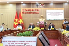 At the working session between Standing Deputy Prime Minister Nguyen Hoa Binh and authorities of central Quang Ngai province (Photo: VNA)