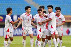 The U23 Vietnamese team celebrate beating Laos in the 2025 ASEAN U23 Championship on July 19. (Photo: vietbao.vn)
