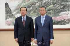 Vietnamese Ambassador to China Pham Thanh Binh (R) and Vice Chairman of the Foreign Affairs Committee of the National People’s Congress of China Fu Ziying at their meeting on March 18 (Photo: VNA)