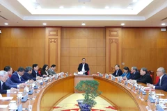 Politburo member and Standing Member of the Party Central Committee’s Secretariat Tran Cam Tu chairs a working session with the Party Central Committee Office and relevant agencies to review preparations for the 14th National Party Congress. (Photo: VNA)