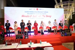Da Nang city leaders and delegates at the ceremony to inaugurate two new international flight routes from Manila and Bali to Da Nang. (Photo: VNA)