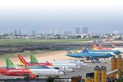 Fuel surcharge adjustments are seen as a short-term solution to cope with cost volatility. (Photo: VNA)