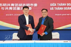 At the signing ceremony of the Memorandum of Understanding on cooperation between The youth unions of Ho Chi Minh City and China's Chongqing city. (Photo: VNA)