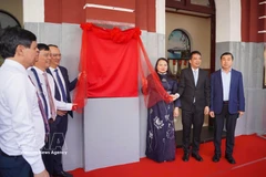 Delegates perform the ceremony to officially declare Hue Railway Station a tourist destination (Photo: VNA)