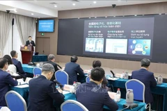 The Vietnamese delegation learn about the smart court model (using AI to support trials) at the Shenzhen Intermediate People's Court (SIPC), Guangdong province, China (Photo: VNA)