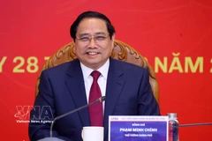 Prime Minister Pham Minh Chinh addresses the working session with the Academy of Public Administration and Governance (APAG) in Hanoi on February 28. (Photo: VNA)